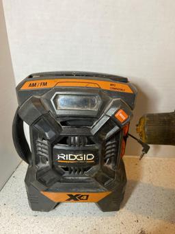 Rigid AM/FM radio drills flashlight angle grinder