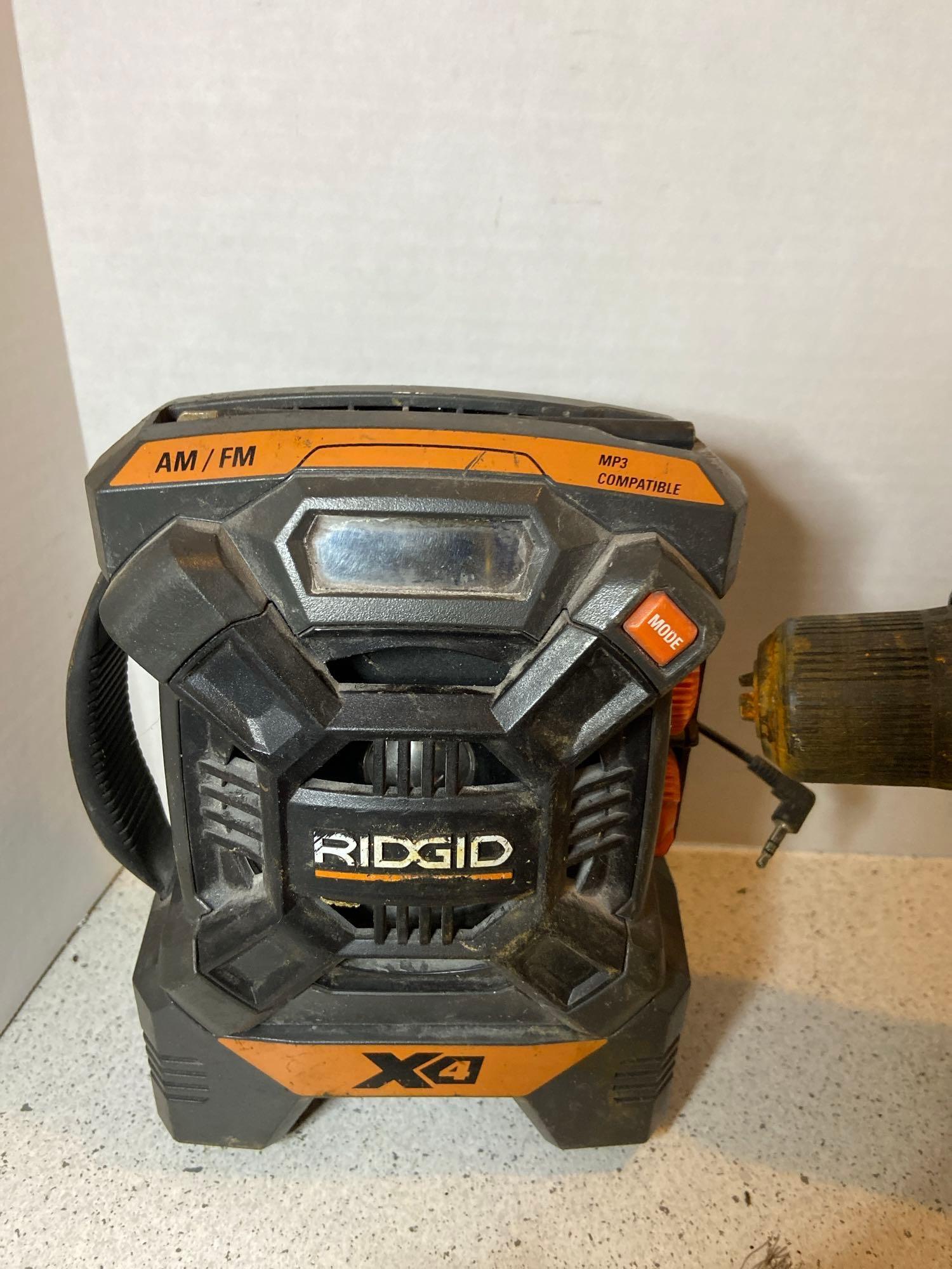 Rigid AM/FM radio drills flashlight angle grinder