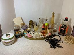 Perfume bottles toiletry tray hair receiver and more