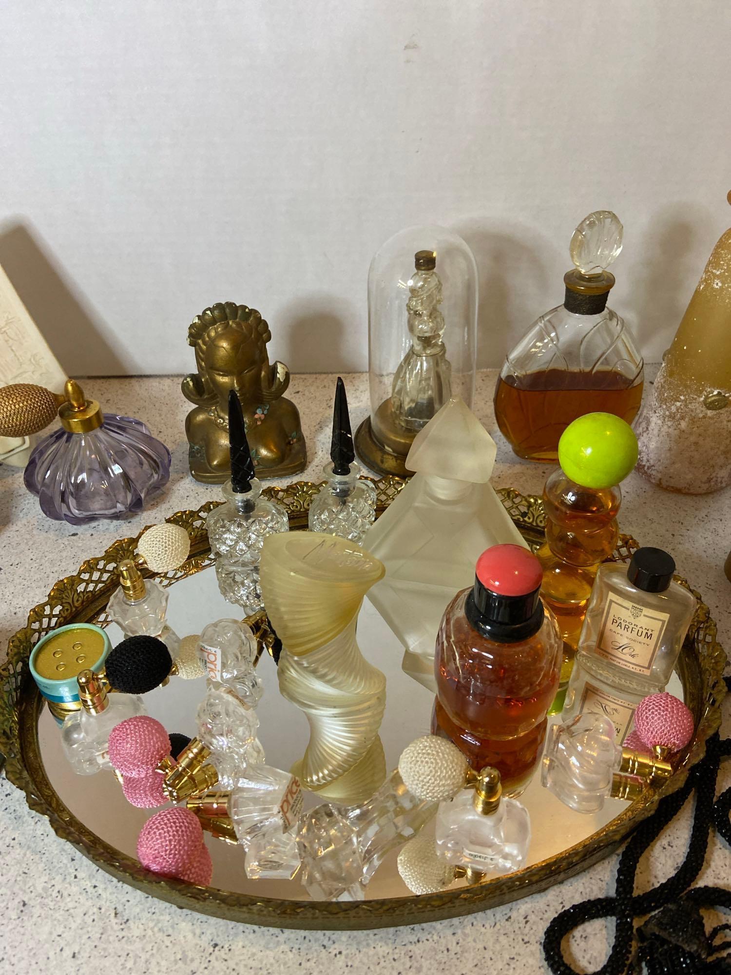 Perfume bottles toiletry tray hair receiver and more