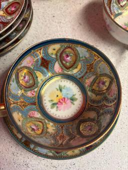 Nippon handpainted beaded cup and saucer set