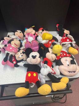 Plush Minnie and Mickey Mouse dolls