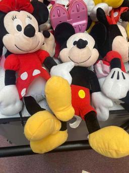 Plush Minnie and Mickey Mouse dolls