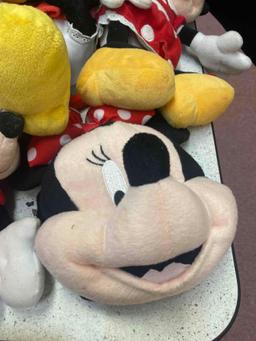 Plush Minnie and Mickey Mouse dolls