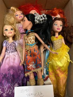 two flats of Disney princess dolls