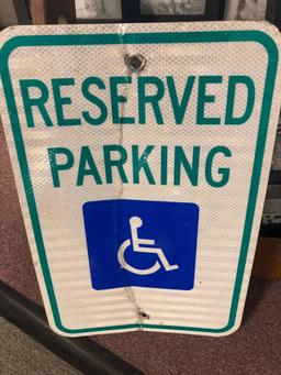 Picture frames gun rack and metal handicap parking sign