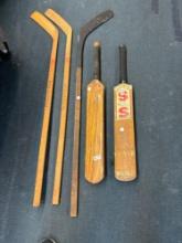 vintage hockey sticks cricket bats