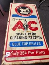 AC spark plug sign box 23 1/2 x 48?