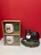 Cast iron cat police and firefighter mugs
