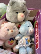 2 boxes of Care Bears