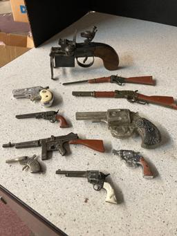 Miniature toy guns, pistols, cap guns, lighter