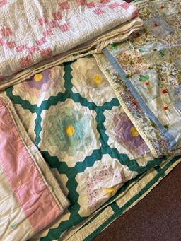 4 well used antique handmade quilts