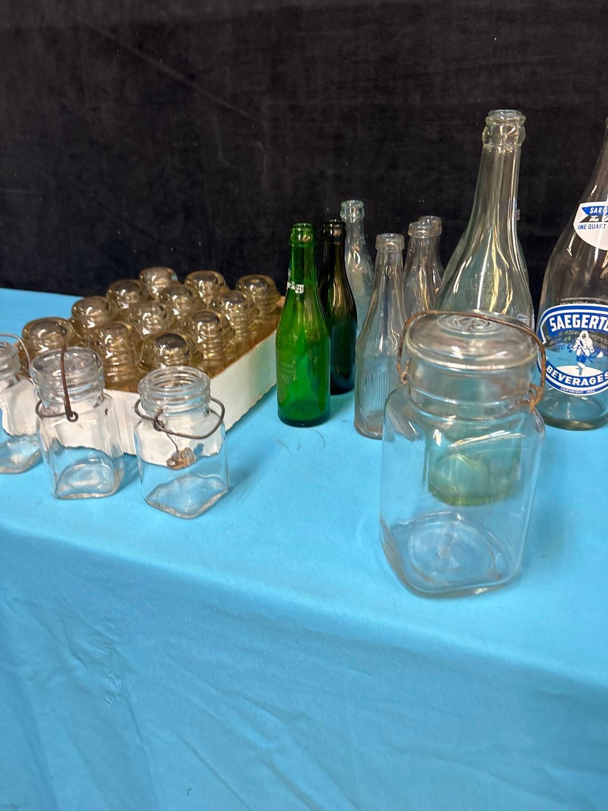 Glass insulators beverage bottles vintage bottles jars