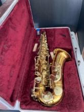 Antique king alto saxophone in case