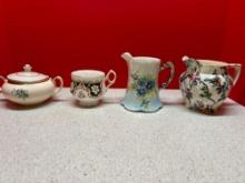 many pieces of Porcelain cups pots etc.