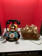 Disney?s goofy telephone and wagon lamp missing a wheel