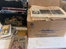 large box of vintage newspapers old greeting cards music books books in magazine holder