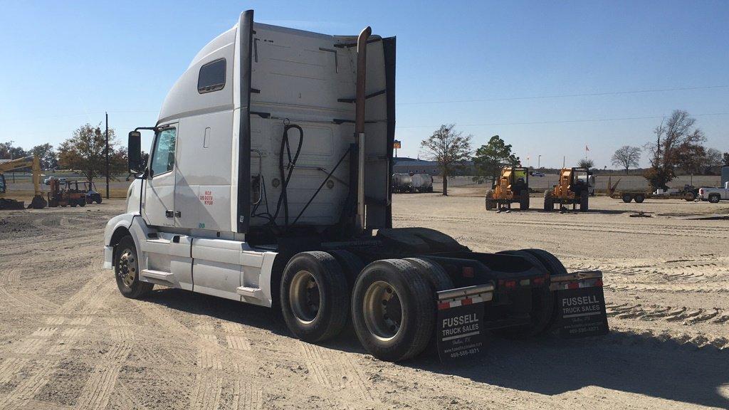 NOT SOLD 2011 VOLVO 670 TRUCK TRACTOR;