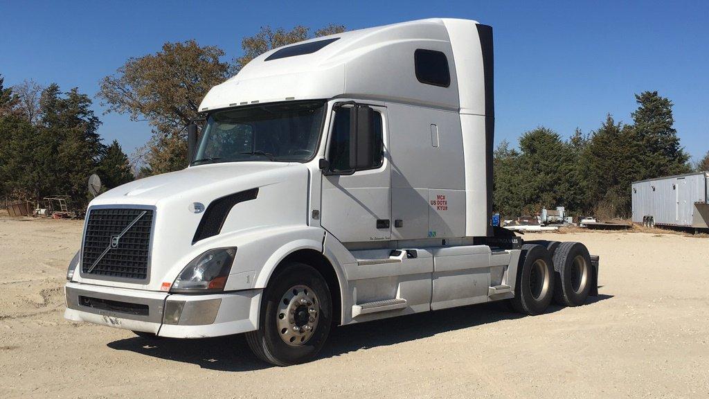 NOT SOLD 2011 VOLVO 670 TRUCK TRACTOR;