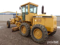 1993 JOHN DEERE 570B MOTOR GRADER;