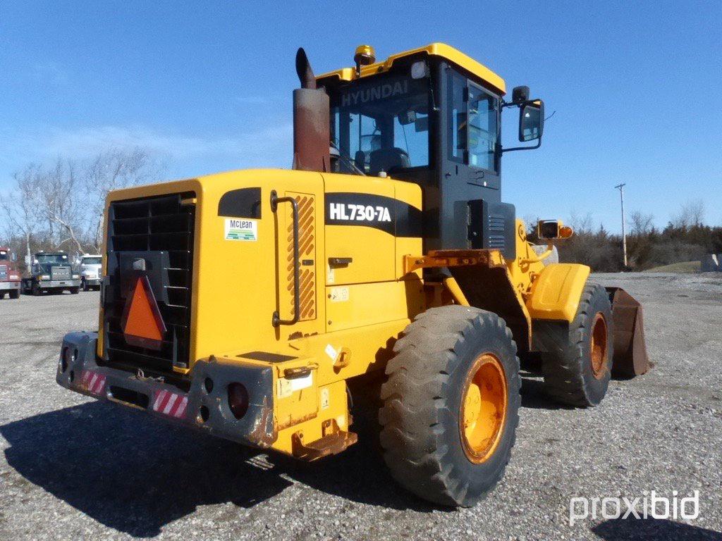 2009 HYUNDAI HL730-7A RUBBER TIRE LOADER;