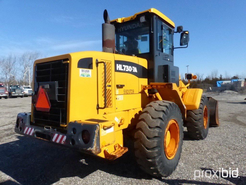 2009 HYUNDAI HL730-7A RUBBER TIRE LOADER;