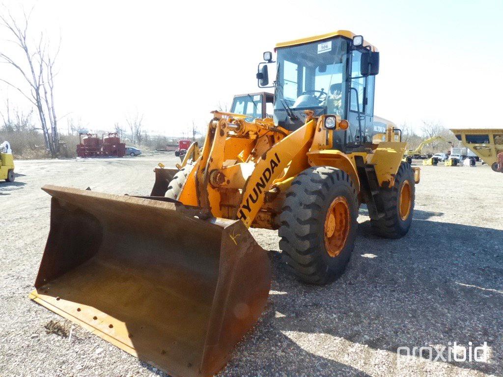 2009 HYUNDAI HL730-7A RUBBER TIRE LOADER;