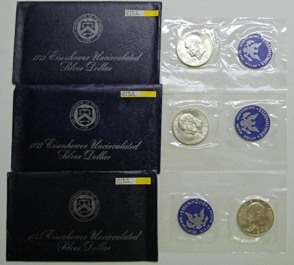 U.S. Mint 1972, 1973, 1974 Blue Envelope Eisenhower Uncirculated Silver Dollars