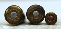 2 Rem UMC 8 mm Label Rifle Collector Cartridges and 1 Unmarked 8 mm Label Pistol Collector Cartridge