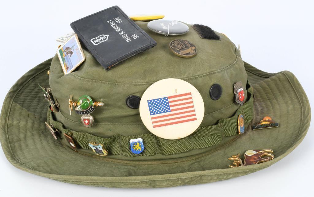 OD green U.S. Military hat with vintage pins