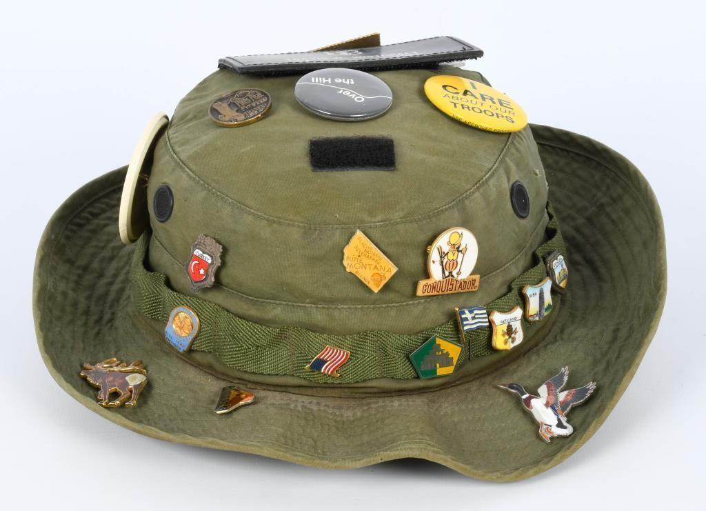 OD green U.S. Military hat with vintage pins