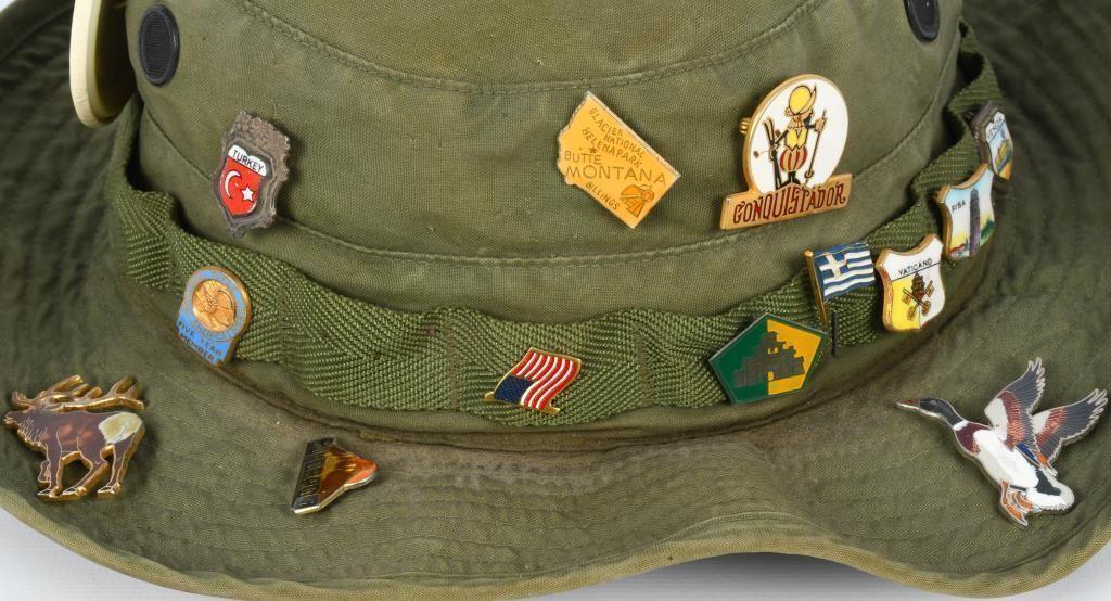 OD green U.S. Military hat with vintage pins