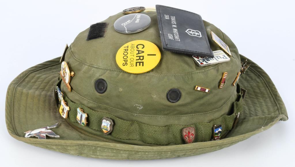 OD green U.S. Military hat with vintage pins