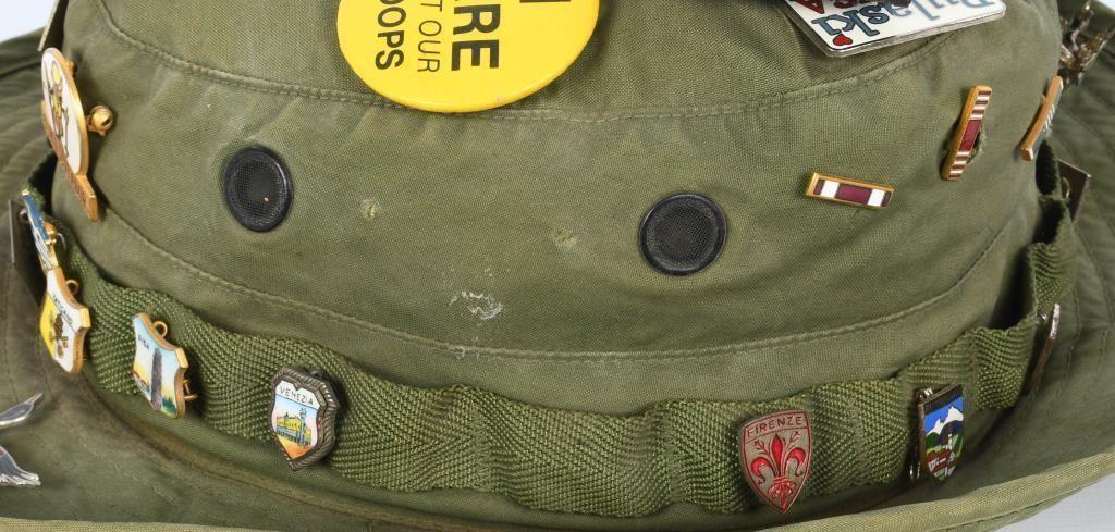 OD green U.S. Military hat with vintage pins