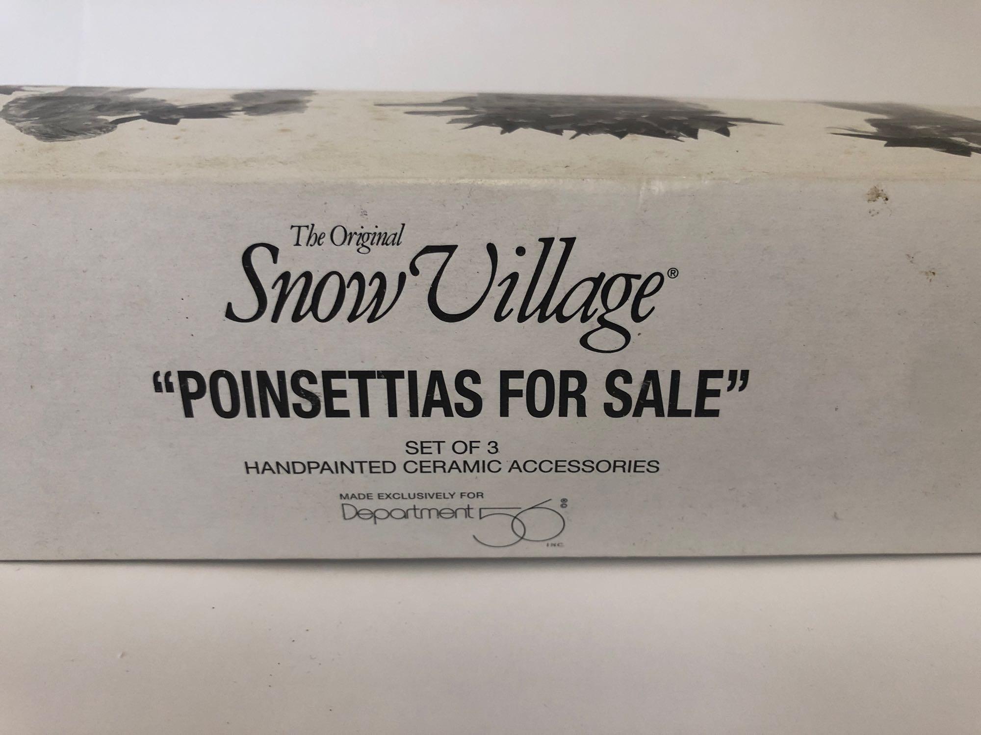 The original Snow Village-Department 56 "Poinsettias for Sale"