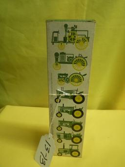 EIGHT JOHN DEERE MINIATURE TOY TRACTORS