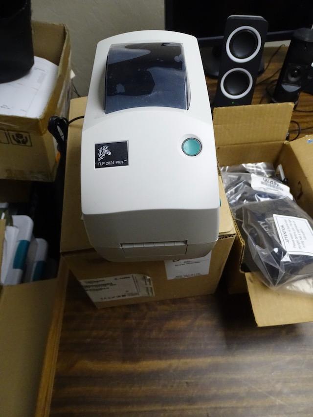 ZEBRA TLP 2824 PLUS RECEIPT MACHINE, FIFTY SHOT MR2 GUN