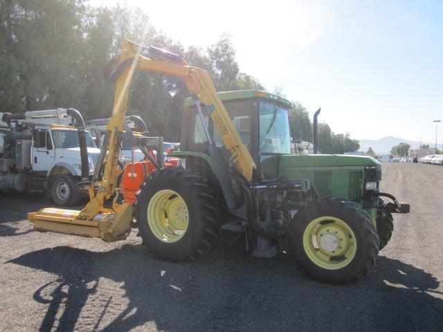 2000 JOHN DEERE 6310 MOWER