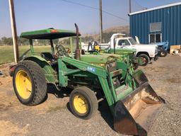 JOHN DEERE 1050 TRACTOR. W/ LOADER.