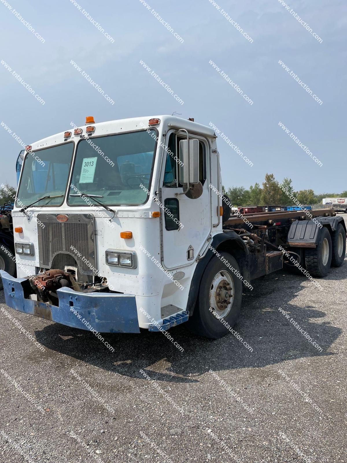 1994 PETERBILT 320 ROLL OFF TK