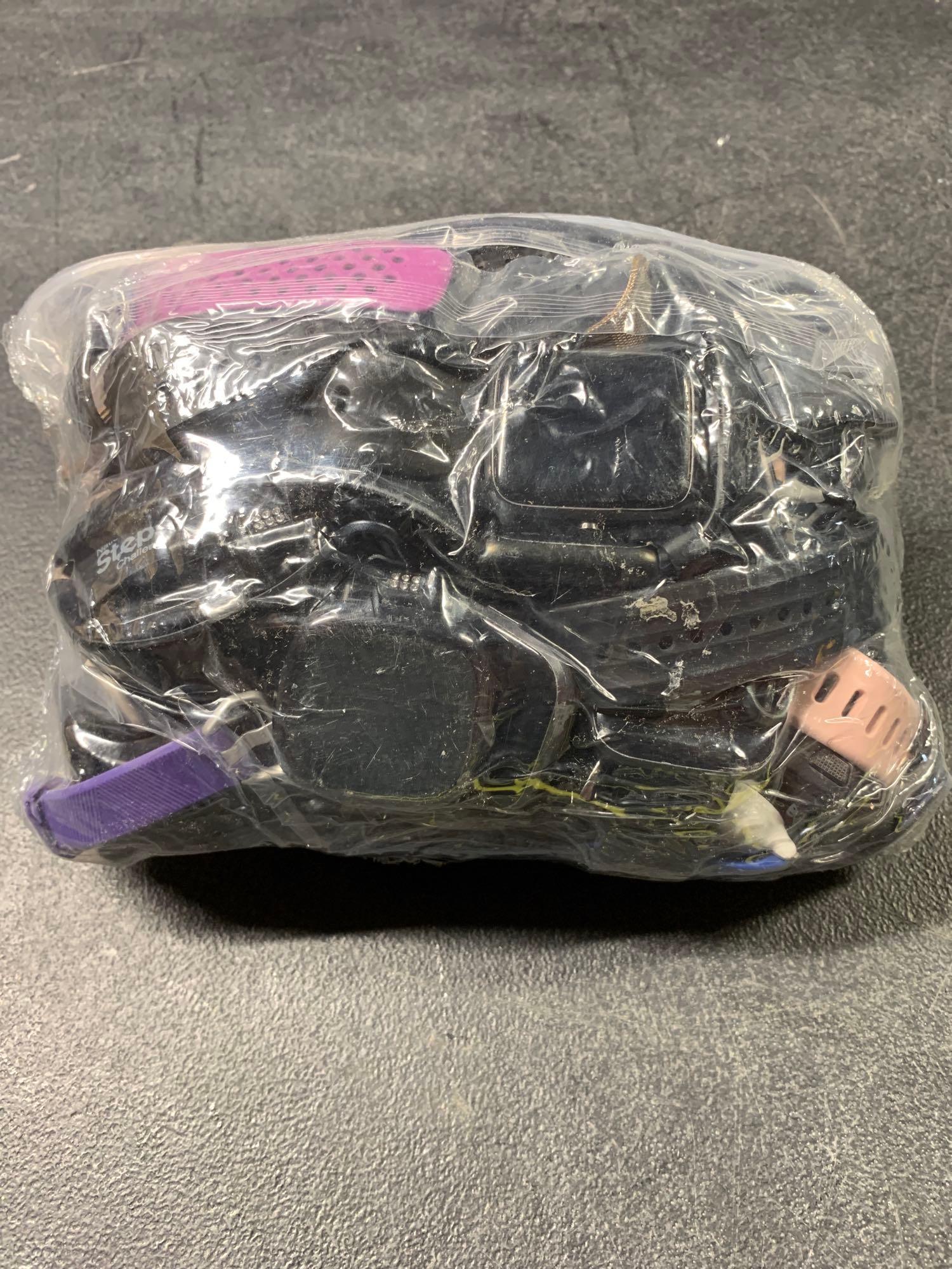 1 BAG OF FITNESS TRACKERS