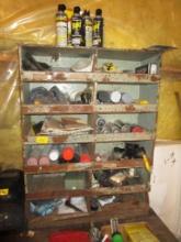 Shelf of Paint and Abrasive Paper