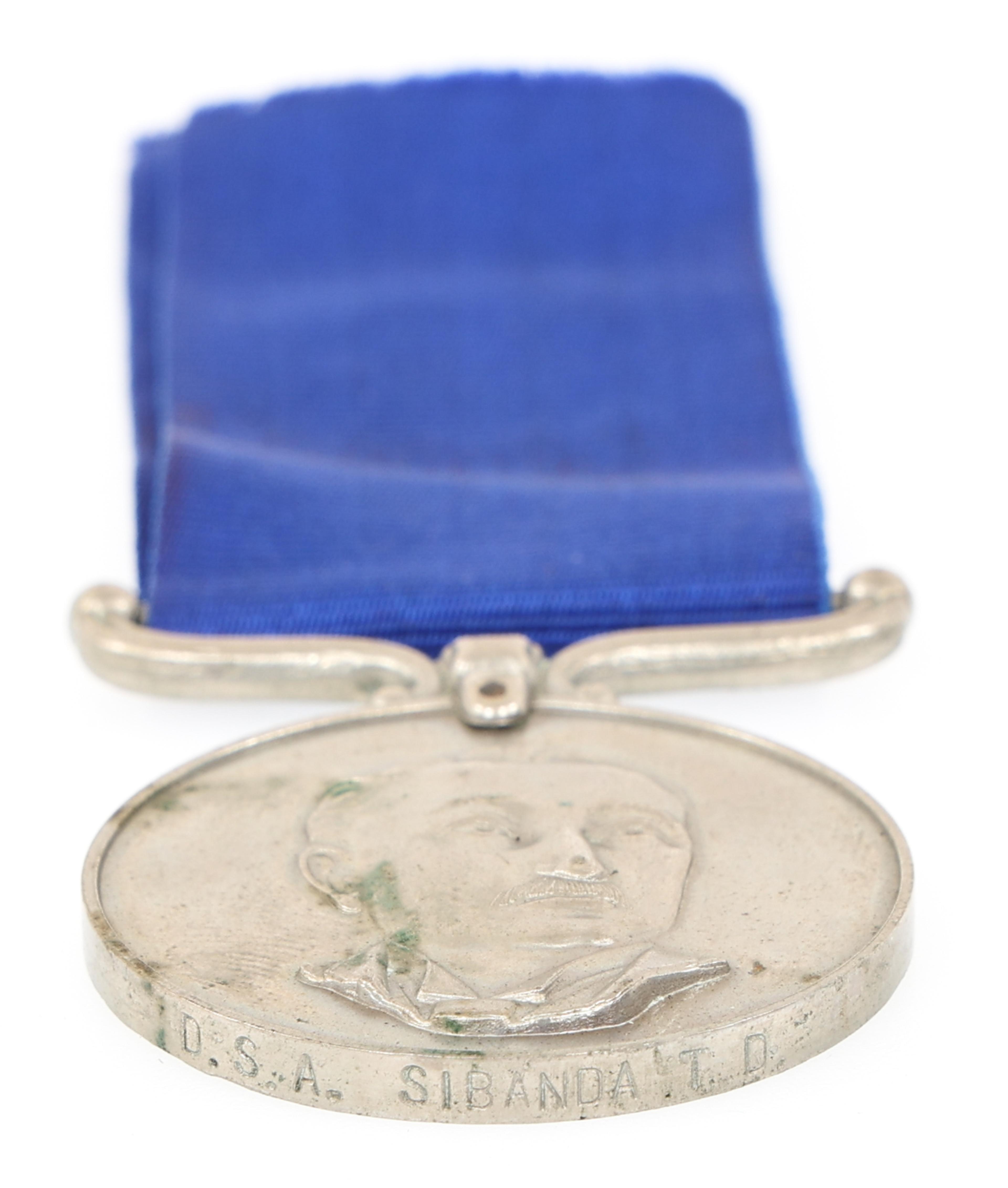 RHODESIAN UDI DISTRICT SERVICE NAMED MEDAL LOT