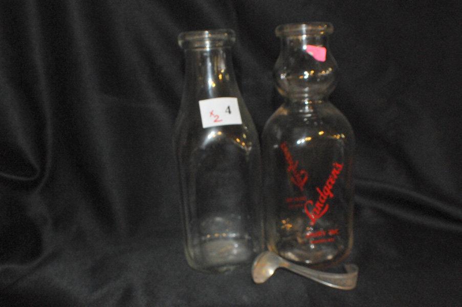 2 GLASS MILK BOTTLES - LANDGREN'S HAS CREAM TOP & SPOON