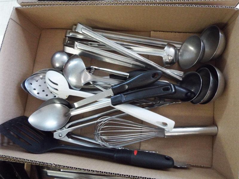 box of kitchen utensils