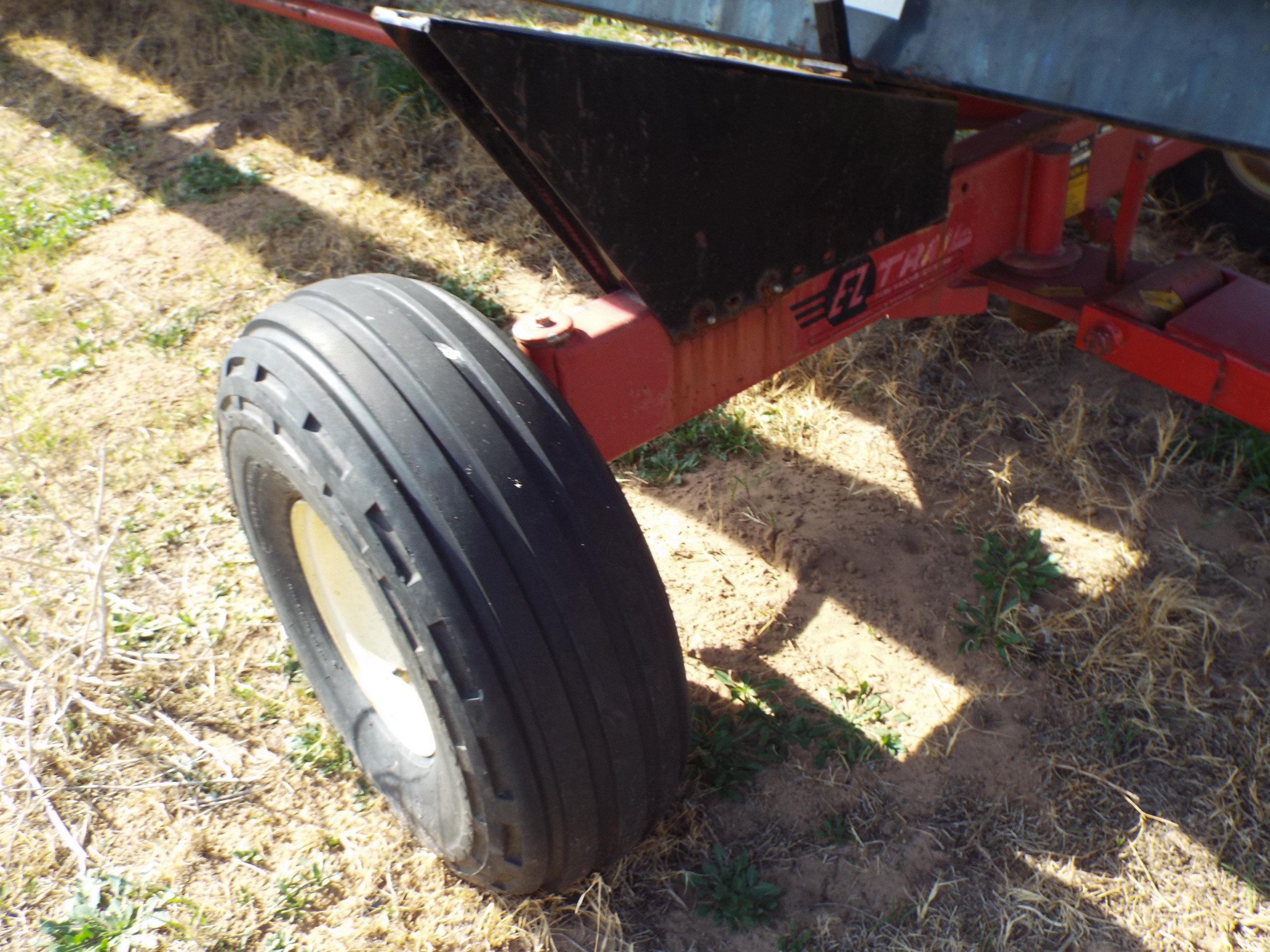 672 E-Z Trail 4 wheel single header trailer