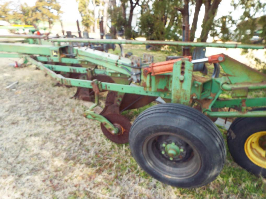 2350-2450 John Deere 6 bottom plow with harrow