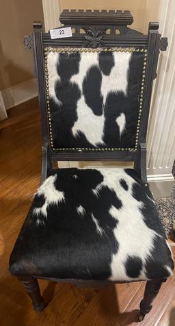 Oak Eastlake Reupholstered Cowhide Chair with Nail head  Trim. Front Legs are on Casters