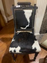 Oak Eastlake Reupholstered Cowhide Chair with Nail head  Trim. Front Legs are on Casters