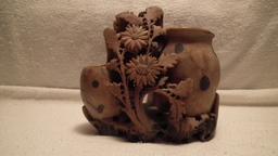 Soapstone double vase, carved vines & flowers w/ black circles on vases